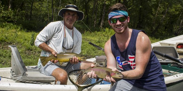 Fly fishing guide trip clients doubled up on the Caney Fork River